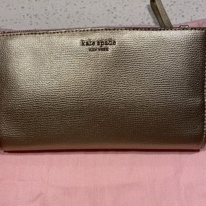 Gold Kate Spade wristlet